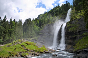 Fototapeta na wymiar waterfall in forest, Sixt-Fer-A-Cheval, Alps, France 