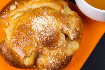 Sweet fresh bun with filling, close up