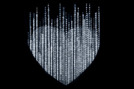 White Heart-shaped composed of binary computer code on a black background. The concept of artificial intelligence