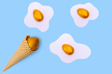 Waffle ice cream cone with a hidden golden Easter egg and scrambled eggs with colored eggs like...