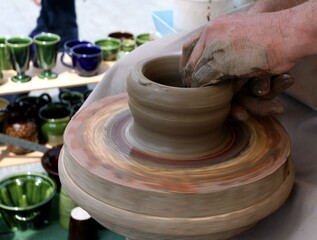 Potter throwing a pot