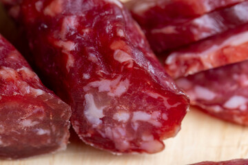 Veal sausage on the table during cooking