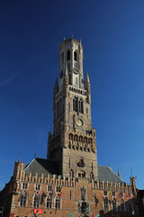 Fototapeta na wymiar Belfry of Bruges, medieval bell tower in the centre of Bruges, Belgium