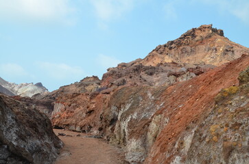 bizarre red and brown rock formation at the dry Hormuz island, Iran