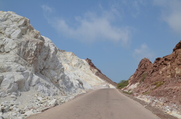Fototapeta na wymiar mighty white rocks close to the street around Hormuz island, Iran