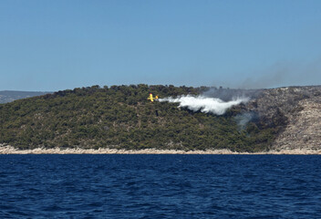 Fire fighting airplane in action, Hvar Island, Croatia