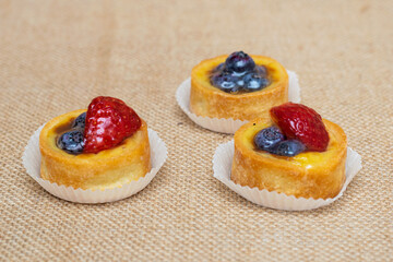 Strawberry and blueberry tarts, sweet and savory cookies