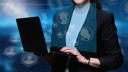 Close-up of laptop in hands of woman using computer for communication, work