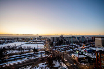 Denver, CO Skyline during twilight. Rocky Mountains