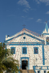 Church of Our Lady of Help, or Nossa Senhora d Ajuda in portuguese, decorated with June festival flags. Ilhabela, colonial town on the coast of Sao Paulo state, Brazil	
