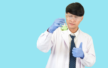 Asian man student scientist in reagent mixing laboratory In a science research laboratory with test...