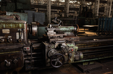 Old equipment, machines, tools in an abandoned mechanical factory