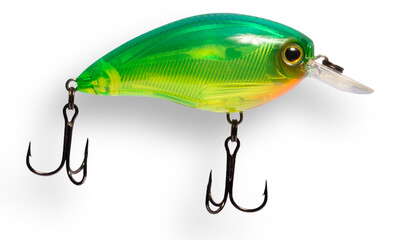 Green plastic fishing lure seen from the side