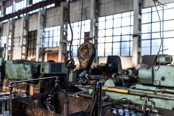 Old equipment, machines, tools in an abandoned mechanical factory