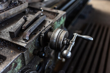 Fototapeta na wymiar Old equipment, machines, tools in an abandoned mechanical factory
