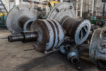 Old equipment, machines, tools in an abandoned mechanical factory