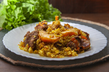 porridge with meat on a plate