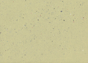 Yellow handmade paper. It contains fragments of other paper. Meant as background