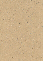 Brown handmade paper. It contains fragments of other paper. Meant as background