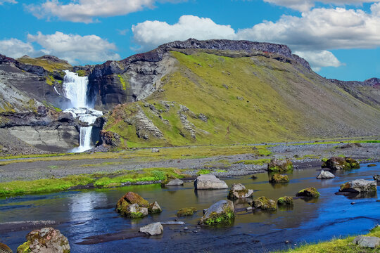 Beautiful icelandic landscape, river and small waterfall, blue summer sky - Eldgja volcanic canyon, Iceland
