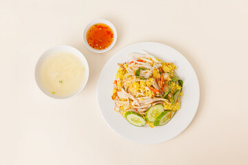 Com ga Nha Trang also know as fried chicken rice, Vietnamese food isolated on white background, top view