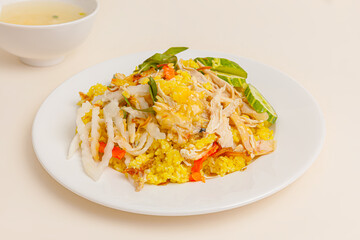 Com ga Nha Trang also know as fried chicken rice, Vietnamese food isolated on white background, close-up