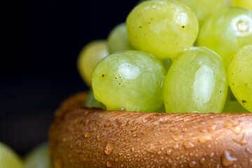 cooking using sweet fresh green grapes with water drops