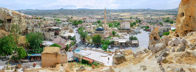 CAPPADOCIA, TURKEY, August 2021: The old troglodyte settlement of Cavusin, where you can see the oldest rock cut church in the region