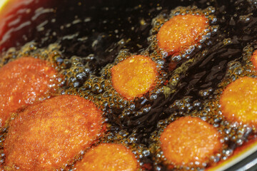 Brazilian food: acaraje fried on the board of baiana. Salvador, Bahia state, Brazil