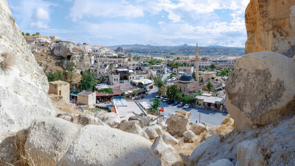 CAPPADOCIA, TURKEY, August 2021: The old troglodyte settlement of Cavusin, where you can see the oldest rock cut church in the region - 569673481