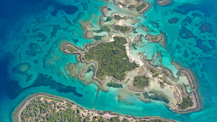 Fototapeta na wymiar Aerial drone photo of Mediterranean paradise destination island complex with sandy organised beaches and turquoise clear sea