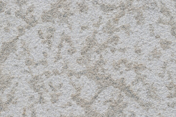 Abstract stone textured grey building wall background.