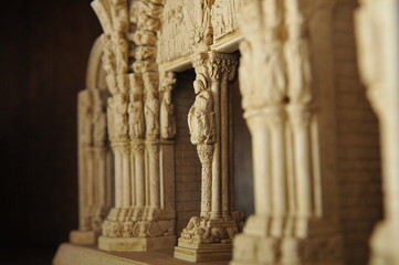 miniature of the portal of a Spanish church, detail of the central column seen from the side