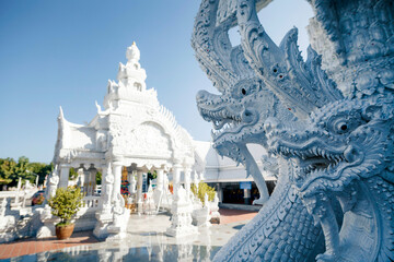 White pavilion with blue sky background. at Wat Ming Muang temple, Nan province, Thailand. - 569679492