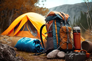 Papier Peint photo Lavable Camping Essential Gear for Wilderness Mountain Hiking: Camping Equipment and Accessories. Photo AI