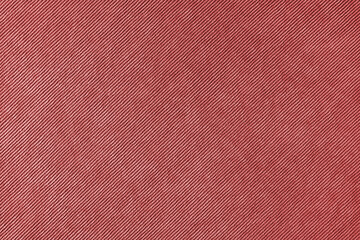 Texture background of velours red fabric. Upholstery velveteen texture fabric, corduroy furniture textile material, design interior, decor. Ridge fabric texture close up, backdrop, wallpaper.