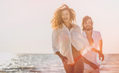 Young couple sharing happy  and love mood on the beach