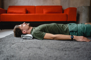 Obraz premium One modern caucasian man adult male practice restorative yoga at home