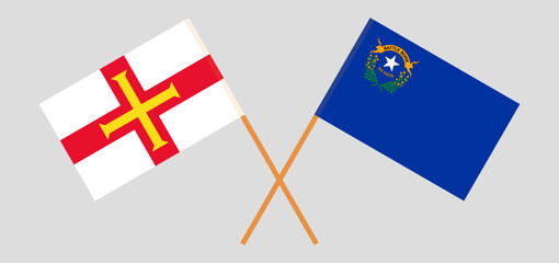 Crossed flags of The State of Nevada and Bailiwick of Guernsey. Official colors. Correct proportion