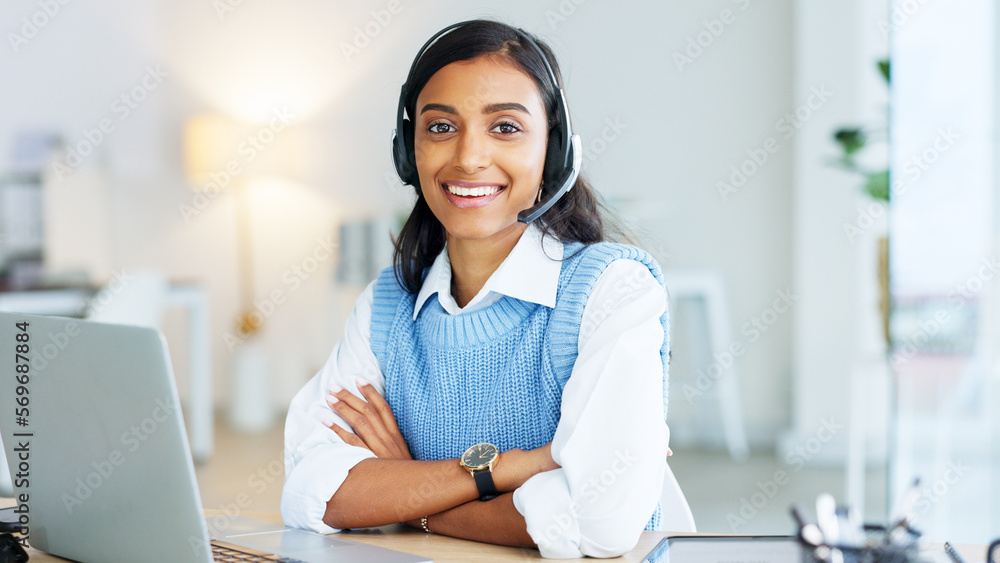 Canvas Prints Portrait of a call center agent using a headset while consulting for customer service and sales support. Confident young businesswoman smiling while operating a helpdesk and looking confident