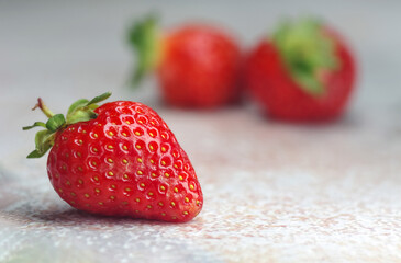 Fresh strawberries on a light background. Fresh organic berries