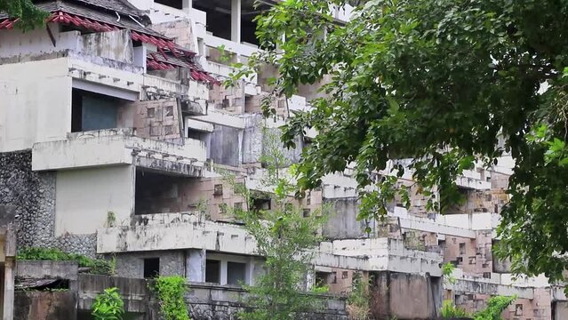 Huge horrible abandoned hotel resort ruins on Phuket island Thailand.
