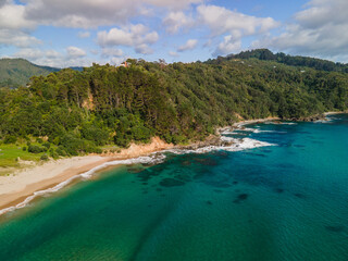 Summer day along Tairua back beach