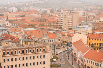 Fototapeta na wymiar Explore the historic old buildings of Oradea, from ancient fortresses to elegant palaces and museums. Embrace the hustle and bustle of city life in Oradea with this busy street photo