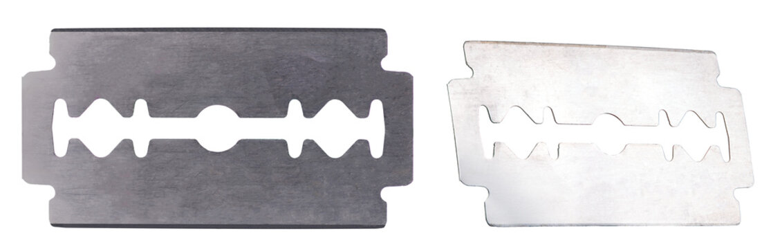 Old razor blade used to shave hair on an isolated background.
