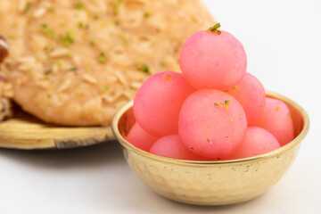 Indian Bengali Mithai Pink Rasbhari Also Called Chena Angoor, Gulabi Mini Rasgulla, Angoori Chaina Cheese Balls Is Milk Based Sweet Made Of Cottage Cheese, Paneer, Chhena Drenched In Sugar Syrup