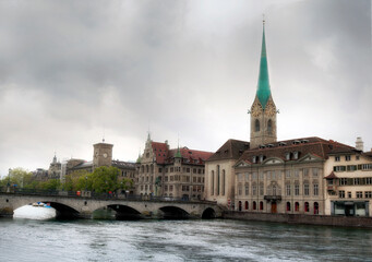 Fototapeta na wymiar Zurich Fraumunster Church by the Limmat river, Zurich, Switzerland