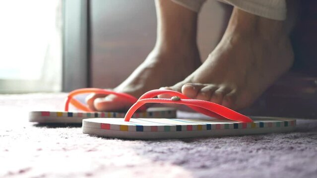 slow motion of girls feet wearing sandal at early morning 