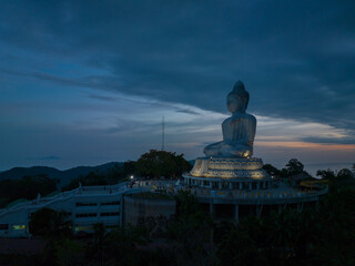 aerial view Phuket big Budha in blue twilight and red horizon..aerial photography scenery sunset at Phuket big Buddha. Phuket Big Buddha is one of the island most .important and revered landmarks o