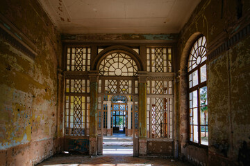 Fototapeta na wymiar Abandoned ruined interior of railway station in Tskaltubo, Georgia